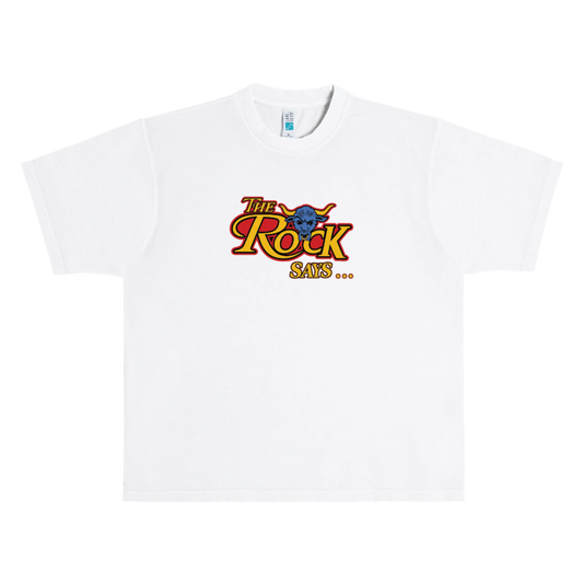 White t-shirt with 'The Rock Says' graphic design on a white background