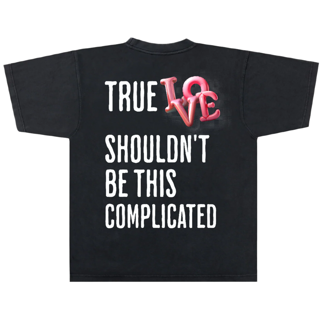 Black t-shirt with 'True Love Shouldn't Be This Complicated' text and pink heart design on a white background